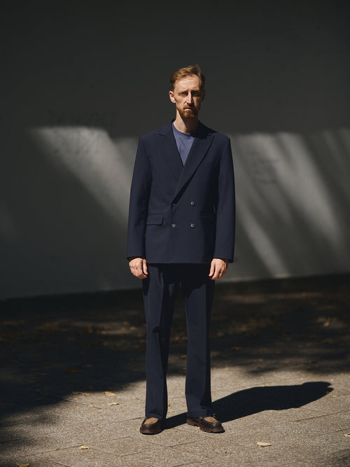 Awards Wide Trousers in navy blue by TODÓR TRAME, image 1 of 5